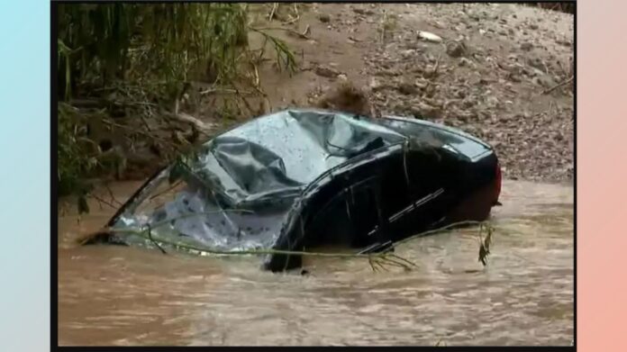 Vespasiano: Carro é arrastado por enxurrada e corpo de adolescente é encontrado — Foto: Reprodução/TV Globo