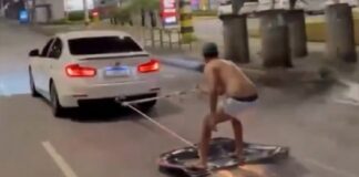 BH: após influencer “surfar em capô”, dono da BMW que o puxava é preso; havia um mandado contra ele BH: após influencer "surfar em capô", dono da BMW que o puxava é preso; havia um mandado contra ele