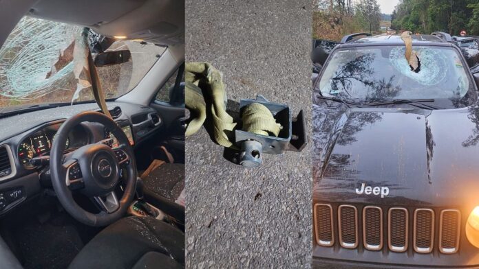 BR-356, Itabirito: cinta de amarração solta em carreta atinge, com violência, veículo que vinha atrás