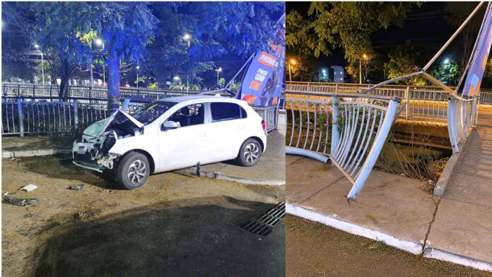 Carro acerta violentamente guarda-corpo às margens do Rio Itabirito Carro acerta violentamente guarda-corpo às margens do Rio Itabirito